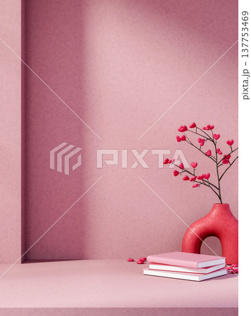 Books and heart shaped flowers in red abstract vase on floor with sunlight shining in pink wall room 137753469