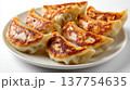 Fried dumpling pan fried gyoza potsticker Asian food snack appetizer crispy plate lunch Pan fried fried dumpling gyoza potsticker Asian food snack 137754635