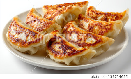 Fried dumpling pan fried gyoza potsticker Asian food snack appetizer crispy plate lunch Pan fried fried dumpling gyoza potsticker Asian food snack 137754635