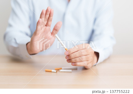 hand refuse to cigarette for World No Tobacco Day concept, quitting smoking to prevent Lung Cancer, COPD, Emphysema and Tuberculosis disease. healthy lifestyle resolution, stop nicotine addiction 137755222