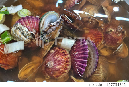 It is a dish full of clams.	 137755242