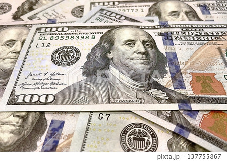 US 100 Dollar Bills Close-up. Detailed view of scattered hundred dollar banknotes. US 100 Dollar Bills Close-up. Detailed view of scattered hundred dollar banknotes. 137755867