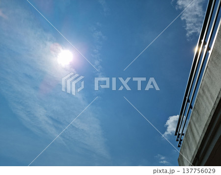 The sky with sunlight and the rooftop railing The sky with sunlight and the rooftop railing 137756029