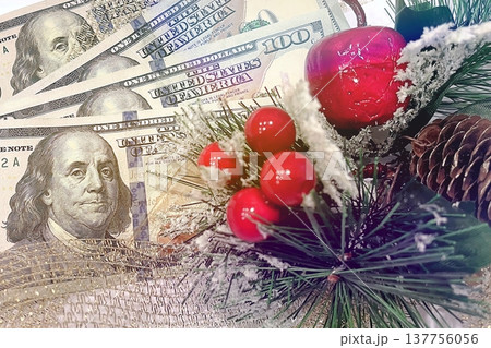 Christmas Cash and Holiday Decorations. $100 dollar bills with festive ornaments. Perfect for holiday budget, bonus, and shopping concepts. Christmas Cash and Holiday Decorations. $100 dollar bills with festive ornaments. Perfect for holiday budget, bonus, and shopping concepts. 137756056