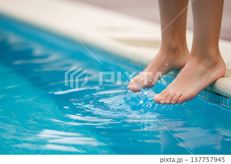 Bare Feet Child on Pool Swimming Water and Summer Reflection 137757945