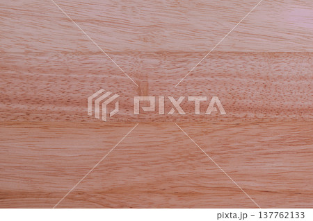 Macro view of natural wood grain and tree rings. Rich timber texture with golden to chocolate brown tones, rustic fibers, and organic patterns for eco-friendly design 137762133