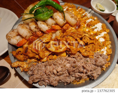 This is a Mexican food table setting. This is a Mexican food table setting. 137762305