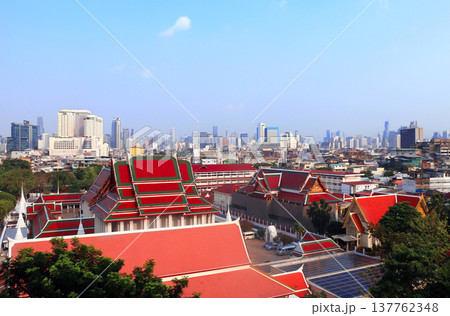 Aerial view cityscape of Bangkok with modern and old residential neighbourhood. Top view of Bangkok from Wat Saket Ratchawora, Thailand. Topic of summer vacation, relaxing, travel, trip, cruises, tour Aerial view cityscape of Bangkok with modern and old residential neighbourhood. Top view of Bangkok from Wat Saket Ratchawora, Thailand. Topic of summer vacation, relaxing, travel, trip, cruises, tour 137762348