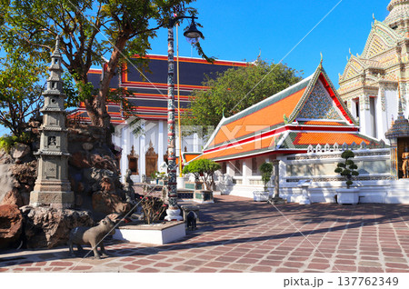 Entrance to Phra Mondop in Wat Pho (Temple of the Reclining Buddha, Wat Phra Chetuphon) complex, sightseeing landmark of Bangkok, Thailand. Topic of vacation, travel, trip, cruises, tour Entrance to Phra Mondop in Wat Pho (Temple of the Reclining Buddha, Wat Phra Chetuphon) complex, sightseeing landmark of Bangkok, Thailand. Topic of vacation, travel, trip, cruises, tour 137762349