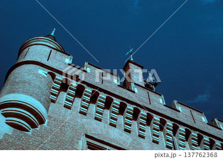 red brick building with blue sky 137762368