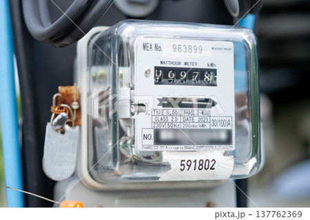 Electric measuring power meter for energy cost at home and office. 137762369