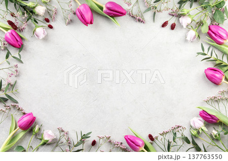 Spring Tulip Floral Frame on Light Stone Background 137763550