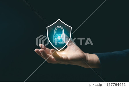 Hand Holding Digital Shield Icon Illustrating Security Protection with Lock Symbol for Cybersecurity and Data Privacy Concept Hand Holding Digital Shield Icon Illustrating Security Protection with Lock Symbol for Cybersecurity and Data Privacy Concept 137764451