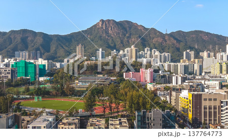 KOWLOON CITY, HONG KONG. Urban roadway linking residential neighborhoods March 14 2026 KOWLOON CITY, HONG KONG. Urban roadway linking residential neighborhoods March 14 2026 137764773