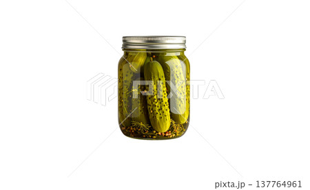 Glass jars containing green pickled cucumbers and fermented green pickled cucumbers are placed separately on a white background. Glass jars containing green pickled cucumbers and fermented green pickled cucumbers are placed separately on a white background. 137764961