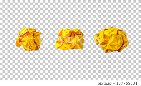 A crumpled, blank piece of paper is placed separately on a white background. 137765331