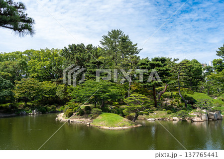 Traditional Shukkei-en Japanese garden with pond in Hiroshima, Japan 137765441
