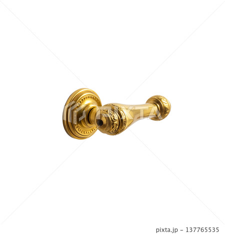 A gold metal house key on a white background. A gold metal house key on a white background. 137765535