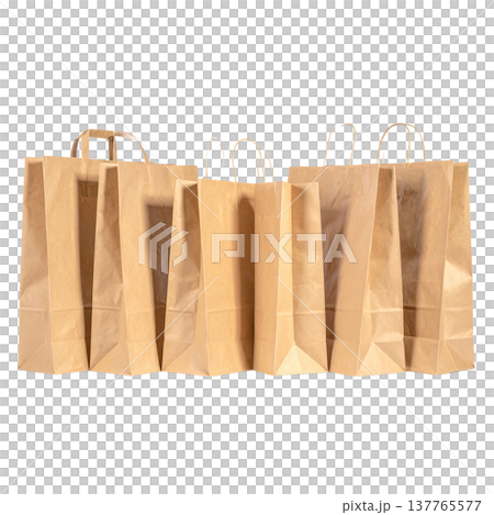 Empty brown paper bags with handles are placed separately on a white background. 137765577