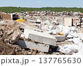 Municipal garbage dump at landfill. Environmental pollution. 137765630