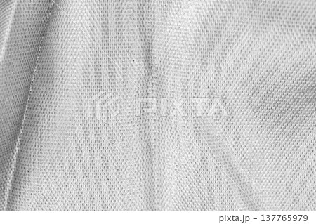 Crumpled shiny silver fabric metal texture background 137765979