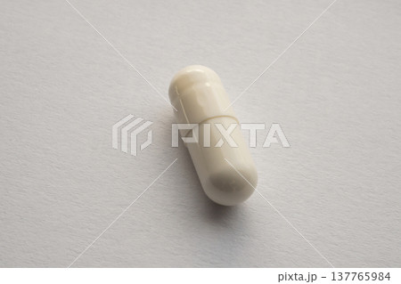 White medicine pill capsule on white background White medicine pill capsule on white background 137765984