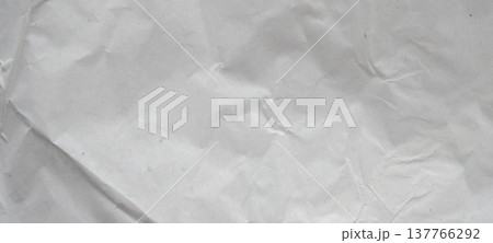 Abstract white crumpled and creased recycle paper texture background 137766292