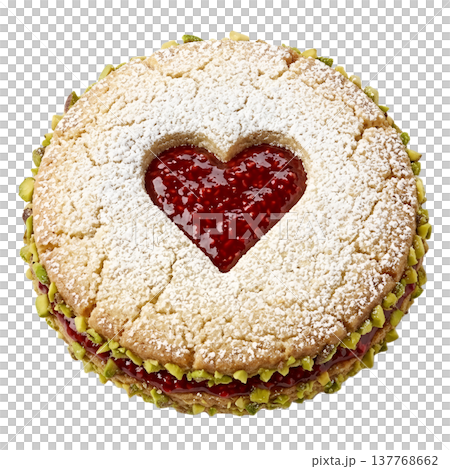Sweet cookie filled with raspberry jam, topped with crushed pistachios and a dusting of powdered sugar, isolated 137768662