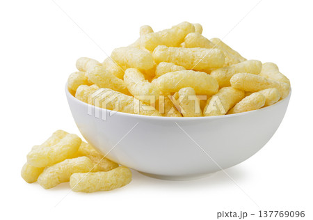 Corn sticks in a plate and a pile on a white background. Isolated 137769096