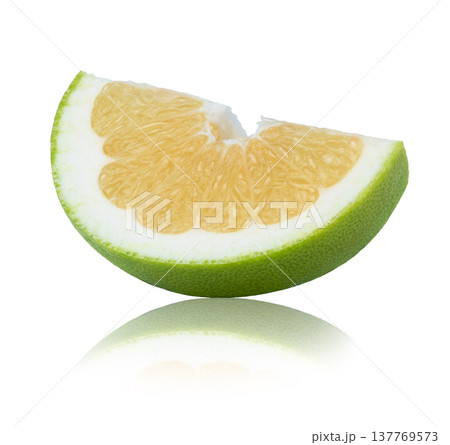 Juicy slice of citrus sweetie, pomelo, pomelit or oroblanco fruit with reflection isolated. 137769573