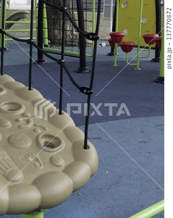 Children playground equipment outdoors park area Children playground equipment outdoors park area 137770872