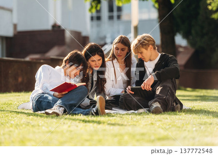 Group of students are near university together Group of students are near university together 137772548