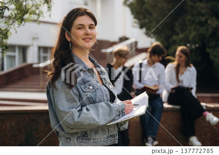 Group of students are near university together 137772785