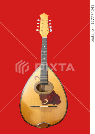 Mandolin isolated on red background 137774345