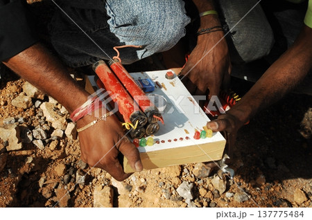 time bomb placed on a dusty mud road time bomb placed on a dusty mud road 137775484