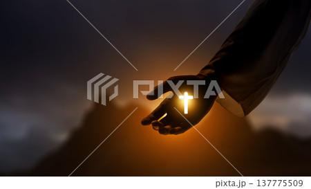 A powerful spiritual image showing a divine hand holding a bright, glowing Christian cross against a dramatic sunset and mountain silhouette background, representing faith and hope A powerful spiritual image showing a divine hand holding a bright, glowing Christian cross against a dramatic sunset and mountain silhouette background, representing faith and hope 137775509