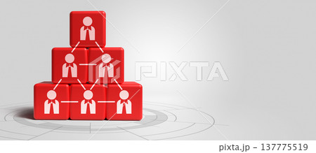 Red cubes with human figure icons stacked in a pyramid shape, representing organizational structure, team management, and corporate leadership concepts 137775519