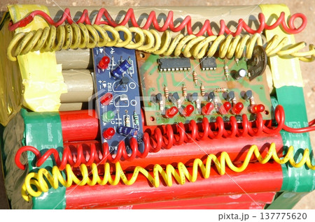 time bomb placed on a dusty mud road 137775620