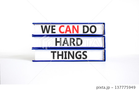 Support, help we can do hard things symbol. Concept words We can do hard things on beautiful books. Beautiful white paper background. Business we can do hard things concept. Copy space. 137775949