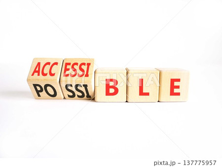 Accessible or possible symbol. Concept words Accessible or Possible on beautiful wooden blocks. Beautiful white table white background. Business accessible or possible concept. Copy space. 137775957