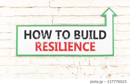 How to build resilience symbol. Concept words How to build resilience on beautiful white sign plate. Beautiful brick wall background. Business how to build resilience concept. Copy space. How to build resilience symbol. Concept words How to build resilience on beautiful white sign plate. Beautiful brick wall background. Business how to build resilience concept. Copy space. 137776025