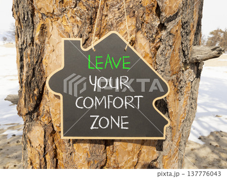 Leave your comfort zone symbol. Concept words Leave your comfort zone on beautiful black blackboard. Beautiful old tree background. Business psychological Leave your comfort zone concept. Copy space. Leave your comfort zone symbol. Concept words Leave your comfort zone on beautiful black blackboard. Beautiful old tree background. Business psychological Leave your comfort zone concept. Copy space. 137776043