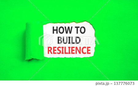How to build resilience symbol. Concept words How to build resilience on beautiful white paper. Beautiful green paper background. Business how to build resilience concept. Copy space. 137776073