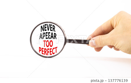 Never appear too perfect symbol. Concept words Never appear too perfect on beautiful magnifying glass. Beautiful white table white background. Business and never appear too perfect concept. Copy space Never appear too perfect symbol. Concept words Never appear too perfect on beautiful magnifying glass. Beautiful white table white background. Business and never appear too perfect concept. Copy space 137776139