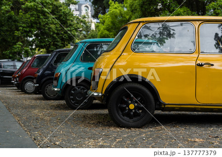 A row of small bright cars in a parking lot in Batumi, Georgia A row of small bright cars in a parking lot in Batumi, Georgia 137777379