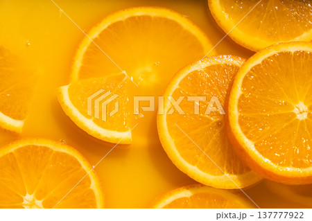 Bright juicy fruity background, oranges drenched in juice 137777922