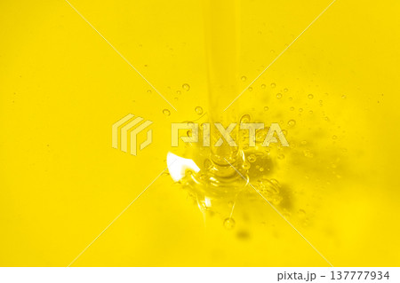 Golden Unrefined Oil Flow, Abstract Food Background Golden Unrefined Oil Flow, Abstract Food Background 137777934