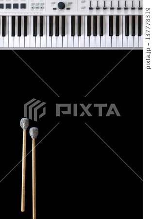Musical background with musical keys and drum sticks top view. Musical background with musical keys and drum sticks top view. 137778319