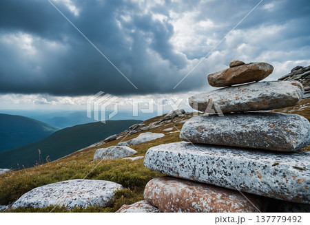 Cairn Stone Stack on Cloudy Mountain Peak 137779492