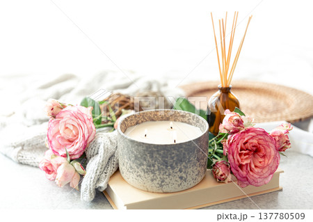 Spa composition with aroma oil diffuser lamp, flowers and candle. Spa composition with aroma oil diffuser lamp, flowers and candle. 137780509